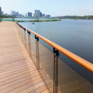 Frameless Tempered Glass Railing System with Stainless Steel Spigot, Clamp, and U-Channel Hardware for Balconies and Stairs