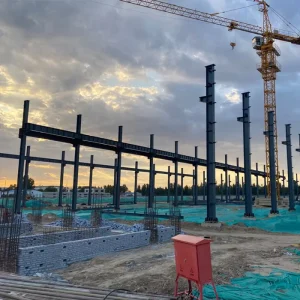 High Strength Steel Structure Workshop Building Prefabricated Warehouse with Windows and Rolling Shutter Doors