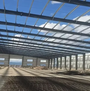 Prefabricated Industrial Steel Warehouse With Galvanized H Section Columns and Metal Cladding System