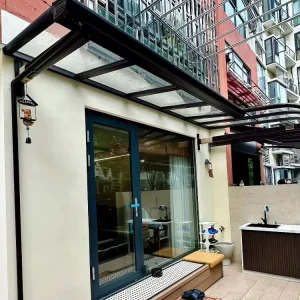 Reinforced Aluminum or Steel Pergola System with Optional Matching Fences Doors Windows Weather Resistant Components